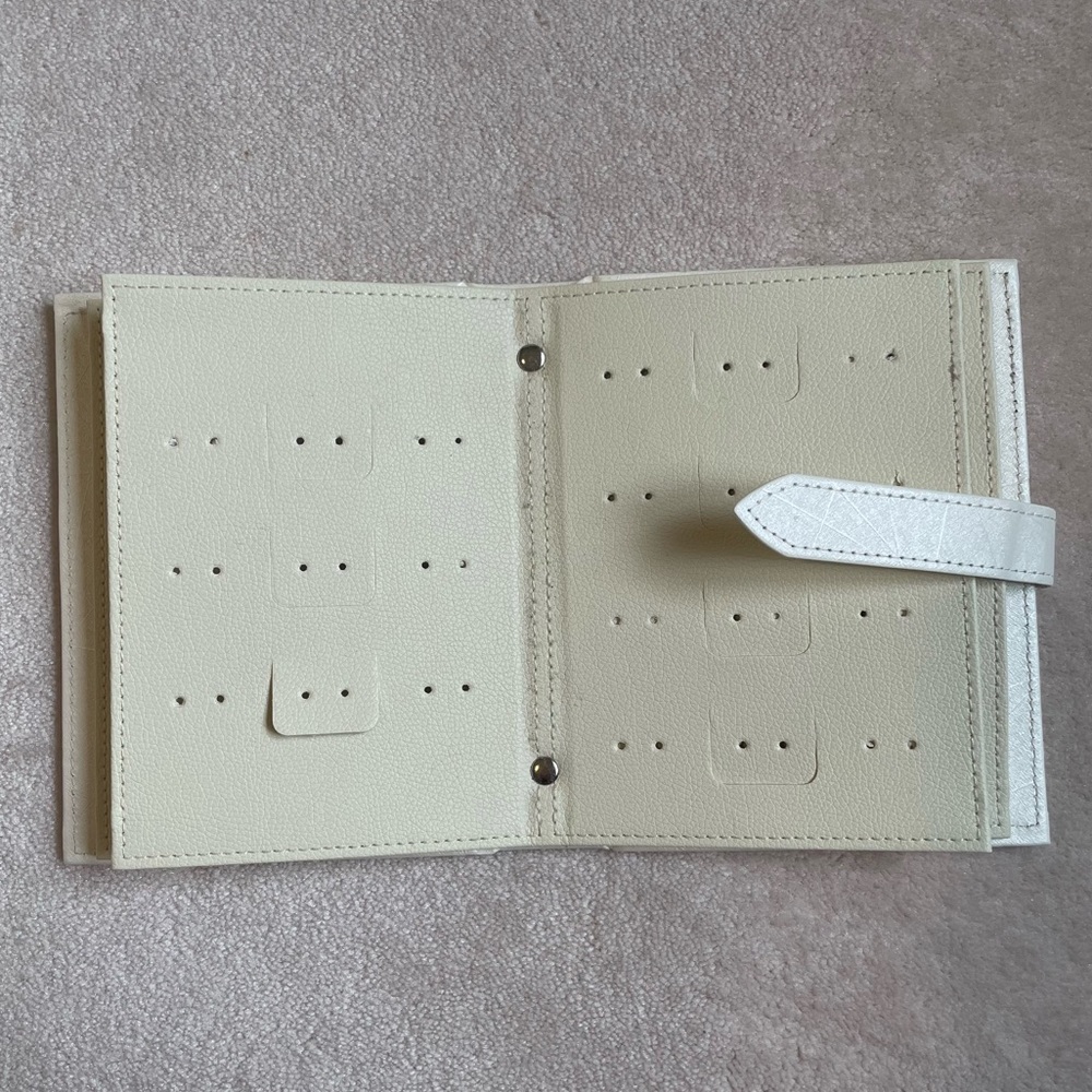 Earrings portable holder - book for storage, display, or travel! Holds 48 pairs!